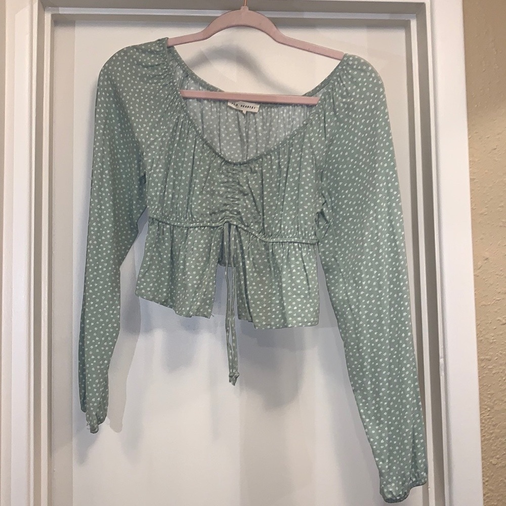 L.A. HEARTS green top w/ white flowers and scrunchies in the front.